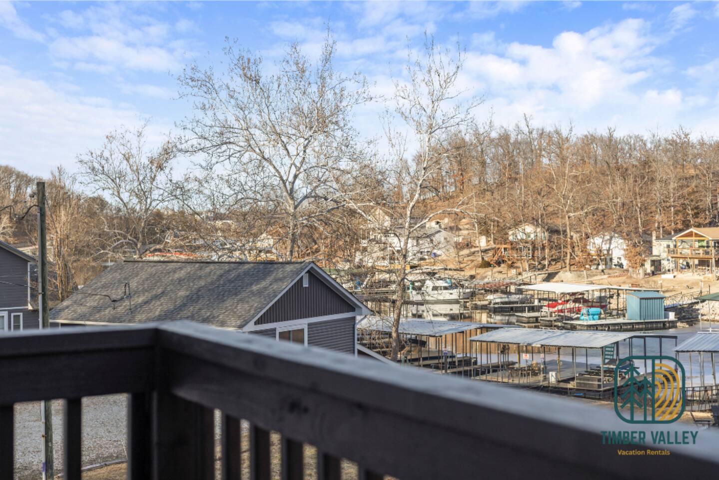 Deck view over the marina from the Sunrise Beach lakefront house